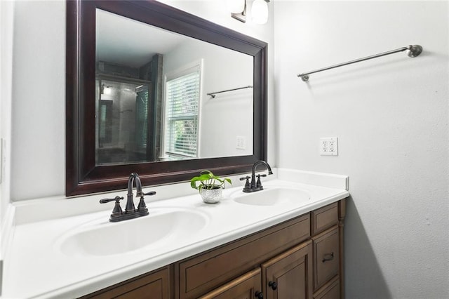 bathroom featuring double vanity and a sink