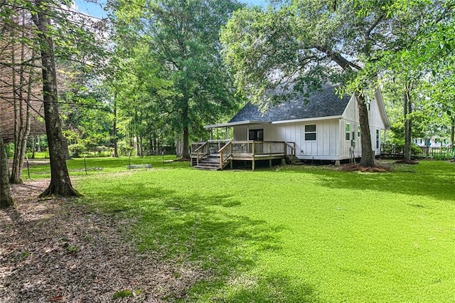 316 Lexington Dr, Mandeville, LA 70471 - view of green lawn with a wooden deck