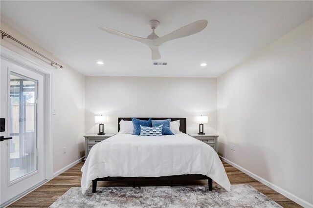 208 Bedford St, La Place, LA 70068 - bedroom with wood finished floors, baseboards, a ceiling fan, and recessed lighting