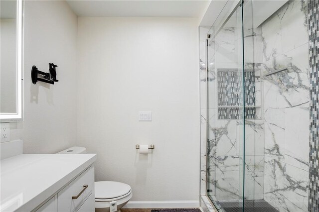 208 Bedford St, La Place, LA 70068 - bathroom with vanity, a marble finish shower, toilet, and baseboards