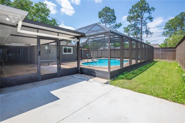 208 Bedford St, La Place, LA 70068 - view of pool featuring a patio area and a lanai