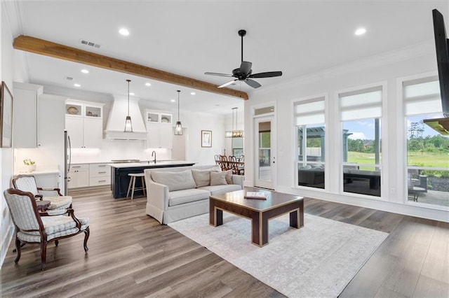 living area with recessed lighting, beam ceiling, a ceiling fan, visible vents, and dark wood finished floors