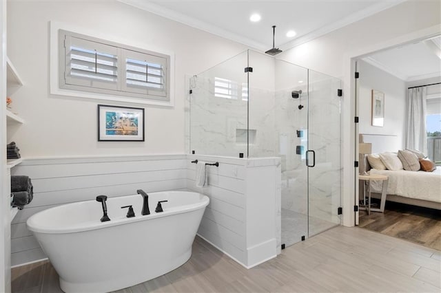 full bathroom featuring ensuite bathroom, a marble finish shower, recessed lighting, ornamental molding, and a freestanding tub