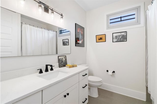 full bath with baseboards, toilet, and vanity