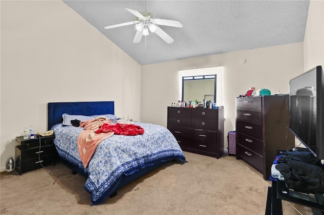 carpeted bedroom with a ceiling fan and lofted ceiling