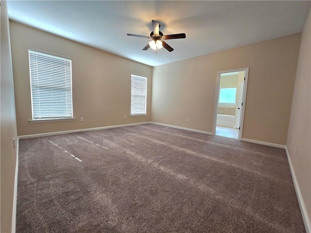 1012 Berkshire Dr, Pearl River, LA 70452 - carpeted spare room featuring a ceiling fan and baseboards