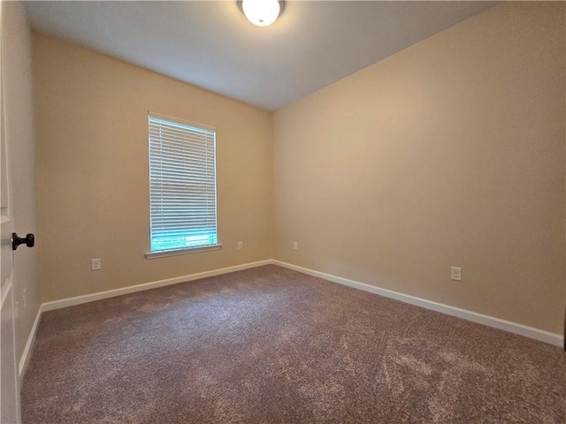 1012 Berkshire Dr, Pearl River, LA 70452 - empty room with dark carpet and baseboards