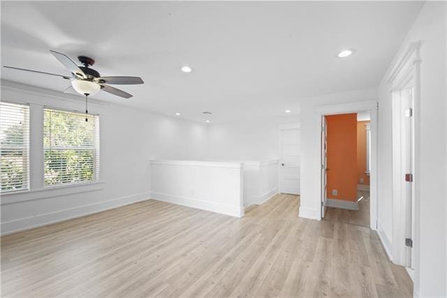 unfurnished room with ceiling fan, light wood-type flooring, recessed lighting, and baseboards