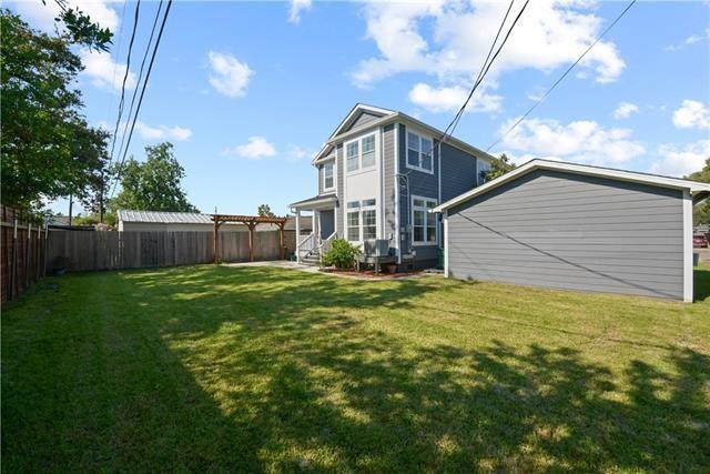 view of yard with a fenced backyard and entry steps