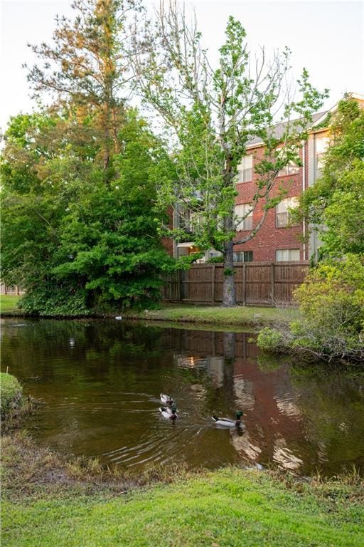 property view of water with fence