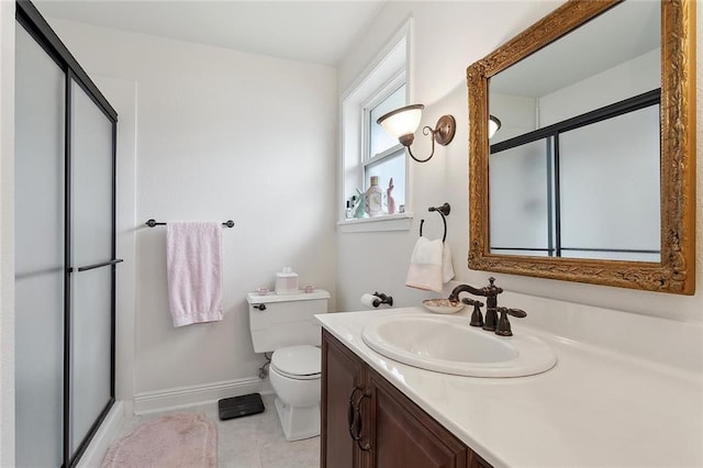 bathroom with a stall shower, baseboards, toilet, tile patterned floors, and vanity