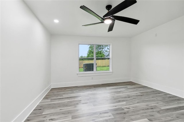 7230 Bullard Ave, New Orleans, LA 70128 - unfurnished room featuring a ceiling fan, light wood-style floors, baseboards, and recessed lighting