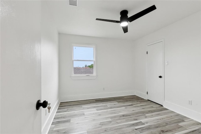 7230 Bullard Ave, New Orleans, LA 70128 - spare room with ceiling fan, light wood-style flooring, and baseboards