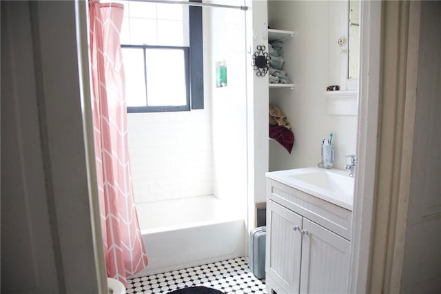 full bathroom featuring vanity and shower / bathtub combination with curtain