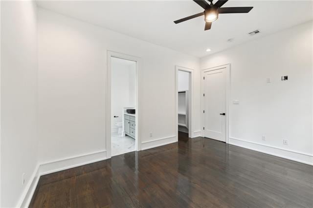 spare room with recessed lighting, ceiling fan, visible vents, baseboards, and wood finished floors