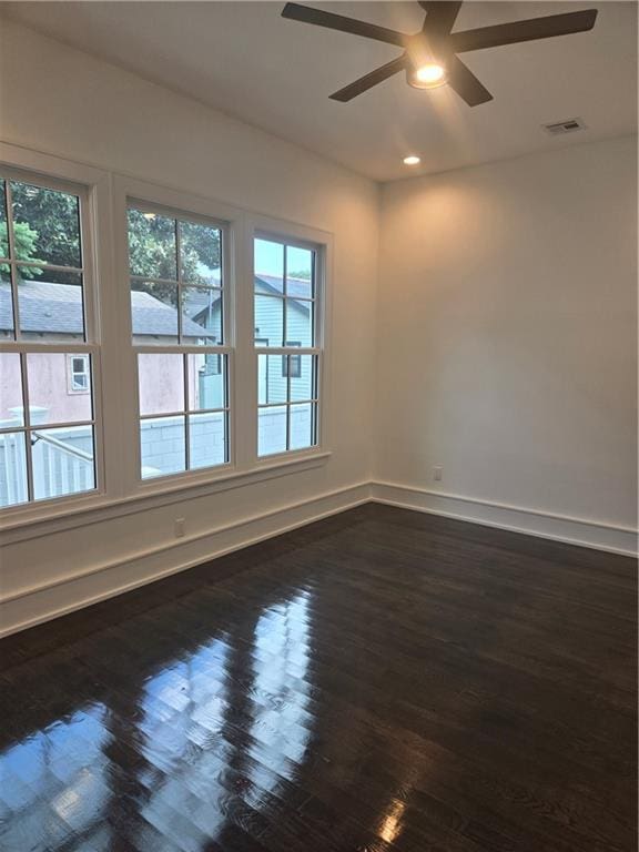 5453 Chartres St, New Orleans, LA 70117 - spare room with ceiling fan, healthy amount of natural light, recessed lighting, and dark wood-style flooring