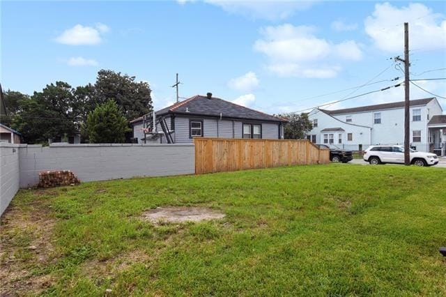 view of yard with fence