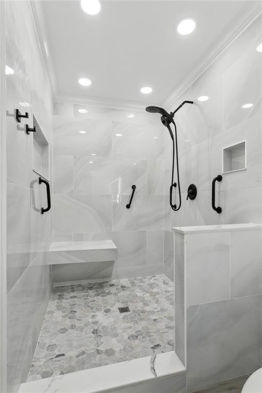 4435 Francecso Rd, New Orleans, LA 70129 - bathroom with recessed lighting, a stall shower, and crown molding