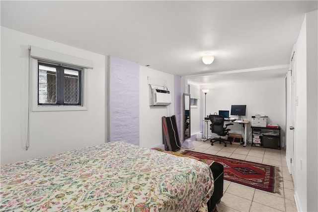2639 Desoto St, New Orleans, LA 70119 - bedroom featuring light tile patterned floors and an AC wall unit
