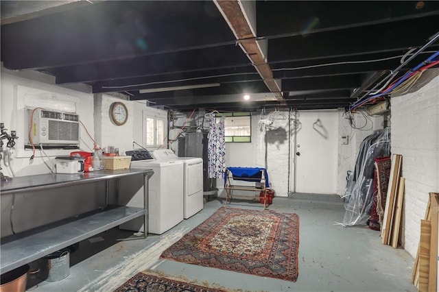 2639 Desoto St, New Orleans, LA 70119 - basement with washing machine and dryer and a wall mounted AC