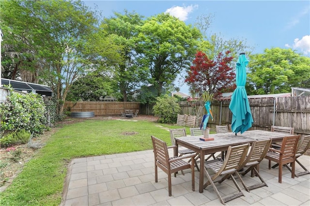 2639 Desoto St, New Orleans, LA 70119 - view of patio featuring a fenced backyard and outdoor dining area