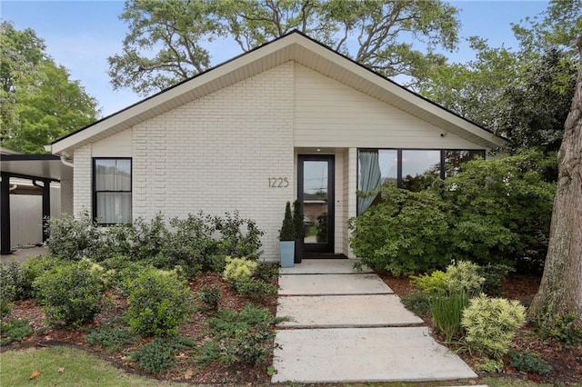 bungalow with brick siding