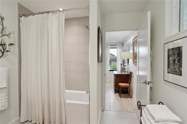 full bathroom with shower / bathtub combination with curtain