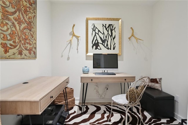 home office featuring baseboards