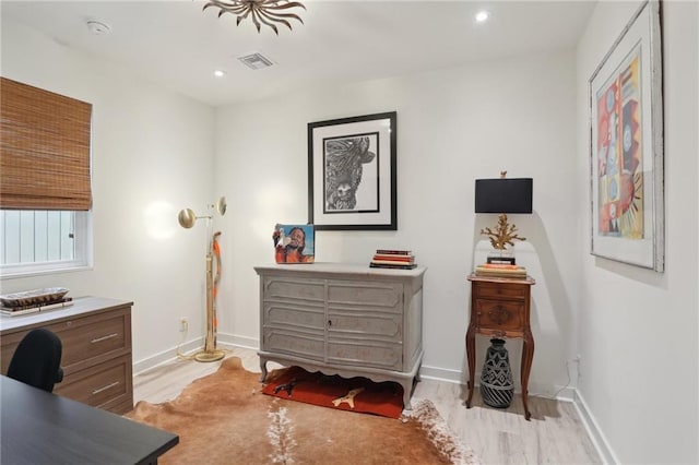 home office featuring baseboards, recessed lighting, visible vents, and light wood-style flooring