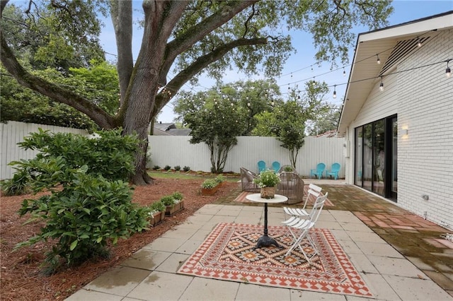 view of patio featuring a fenced backyard