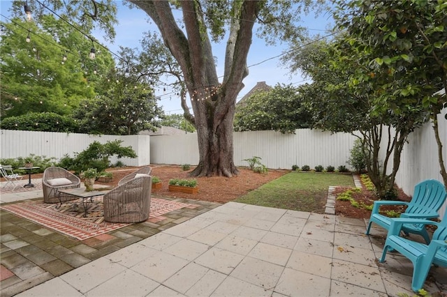 view of patio / terrace featuring a fenced backyard