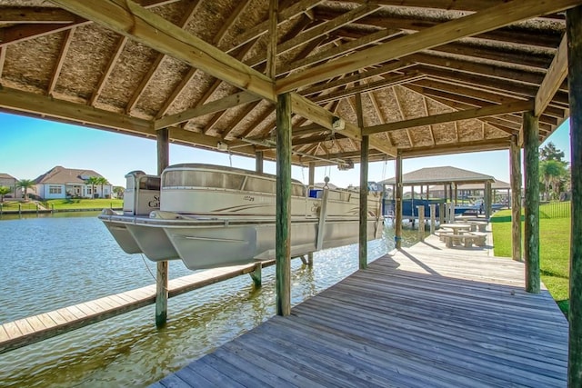 1270 Cutter Cv, Slidell, LA 70458 - dock area featuring boat lift, a water view, and a residential view