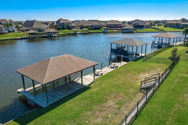 1270 Cutter Cv, Slidell, LA 70458 - dock area with boat lift, a residential view, and a water view