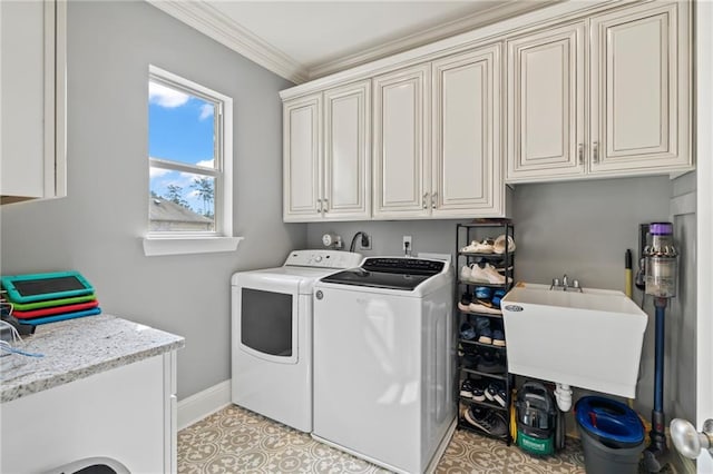 274 W Longview Ct, Madisonville, LA 70447 - laundry room featuring a sink, cabinet space, ornamental molding, washer and dryer, and baseboards