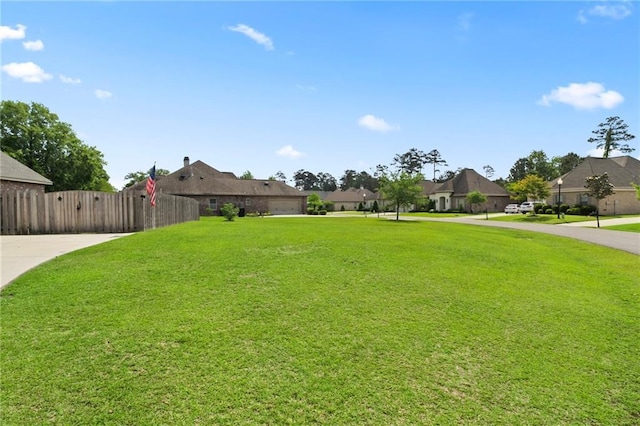 274 W Longview Ct, Madisonville, LA 70447 - view of yard featuring a residential view and fence