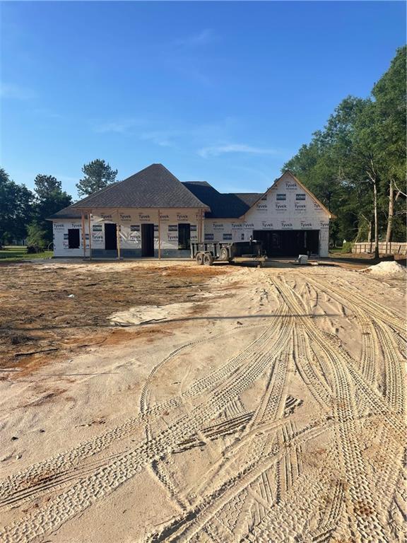 property under construction featuring driveway