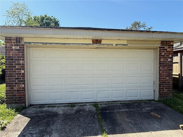 garage featuring driveway
