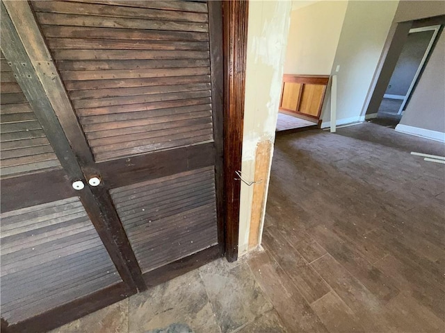 details with wood finished floors and baseboards