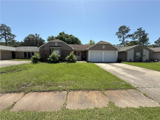ranch-style home featuring concrete driveway, a front yard, and an attached garage
