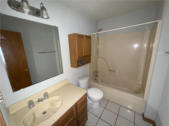 bathroom featuring toilet, tile patterned flooring, shower / tub combination, and vanity