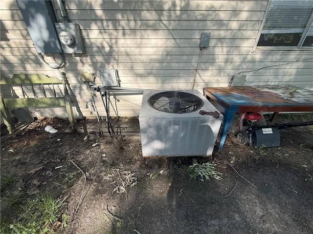details featuring cooling unit and electric meter