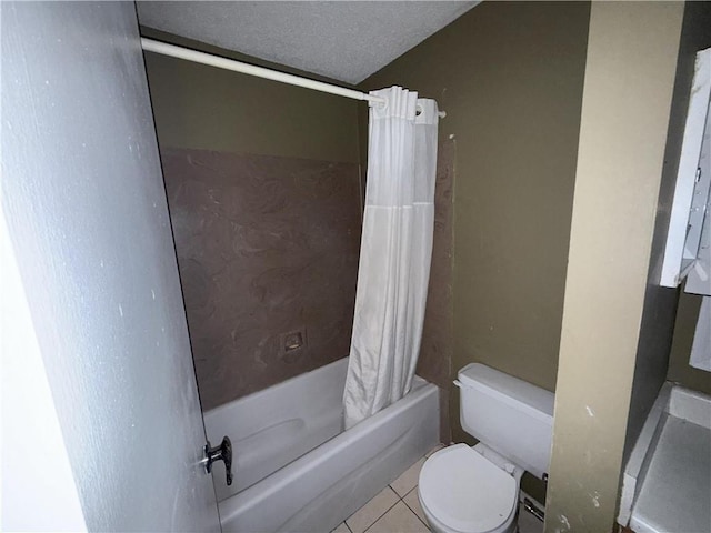 bathroom with shower / bath combo, toilet, tile patterned flooring, and a textured ceiling