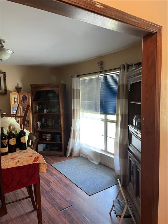 living room with wood finished floors