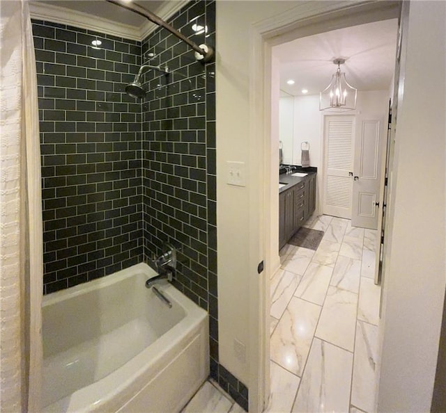 full bathroom with vanity, a notable chandelier, crown molding, marble finish floor, and shower / washtub combination