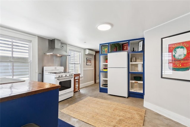kitchen featuring a wall unit AC, white appliances, open shelves, wall chimney range hood, and baseboards