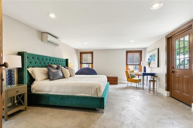 bedroom featuring recessed lighting, a wall unit AC, and multiple windows