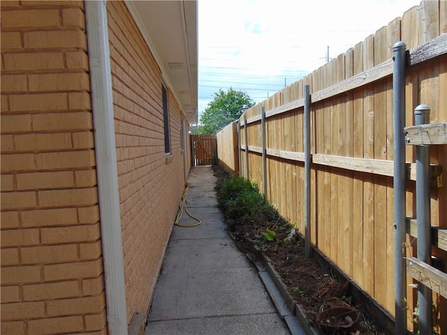 view of home's exterior featuring fence