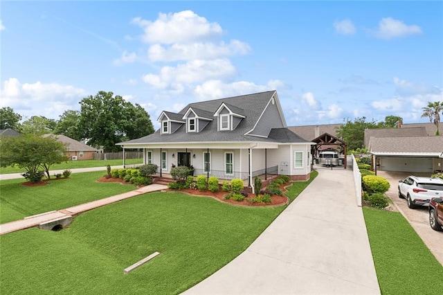 201 Laurel Ct, Luling, LA 70070 - farmhouse inspired home featuring covered porch, a shingled roof, driveway, and a front yard