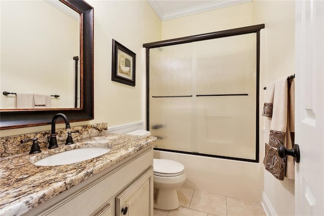 201 Laurel Ct, Luling, LA 70070 - full bathroom with combined bath / shower with glass door, tile patterned floors, ornamental molding, toilet, and vanity