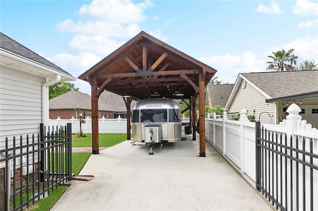 201 Laurel Ct, Luling, LA 70070 - view of patio / terrace with a detached carport and fence private yard